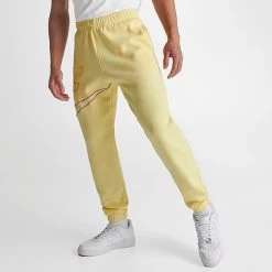 Nike Club Fleece+ Futura Logo Fleece Sweatpants Lemon Chiffon - DX0547 706 -Nike Women Shop DX0547 706 M3