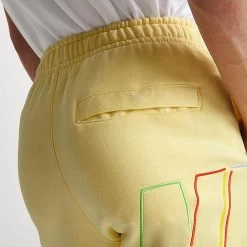 Nike Club Fleece+ Futura Logo Fleece Sweatpants Lemon Chiffon - DX0547 706 -Nike Women Shop DX0547 706 M6